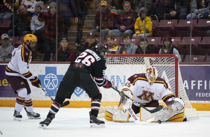 Gophers+goalie+Jack+LaFontaine+denied+St.+Cloud+States+Easton+Brodzinski+during+Minnesotas+victory+in+the+Mariucci+Classic+championship+game.