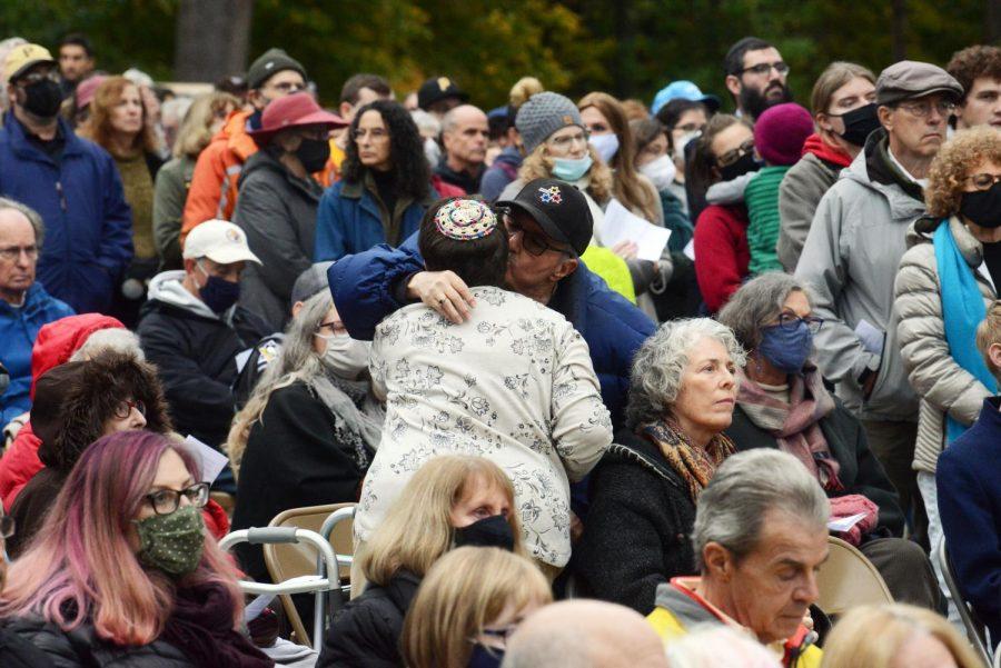 Community+members+embrace+at+a+Wednesday+ceremony+in+Schenley+Park+to+commemorate+three+years+after+the+Tree+of+Life+massacre.