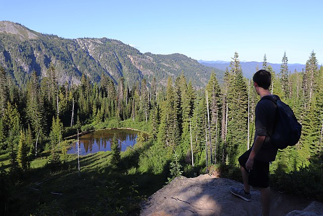 A+hiker+enjoys+the+view+at+Mount+Rainier.
