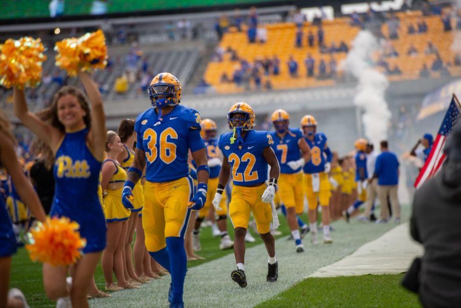 Pitt linebacker Chase Pine and P.J. O’Brien walked into the game against New Hampshire on Sept. 25 at Heinz Field.