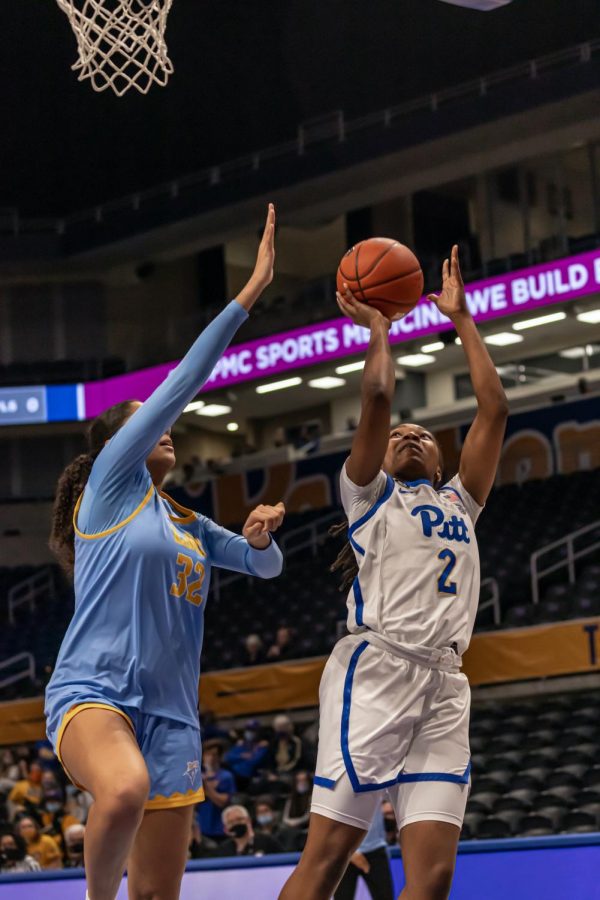 Long Island University first-year guard Tayra Eke (32) attempts to block Pitt sophomore guard Liatu King (2) from making a basket at Wednesday’s game against Long Island University at the Petersen Events Center.
