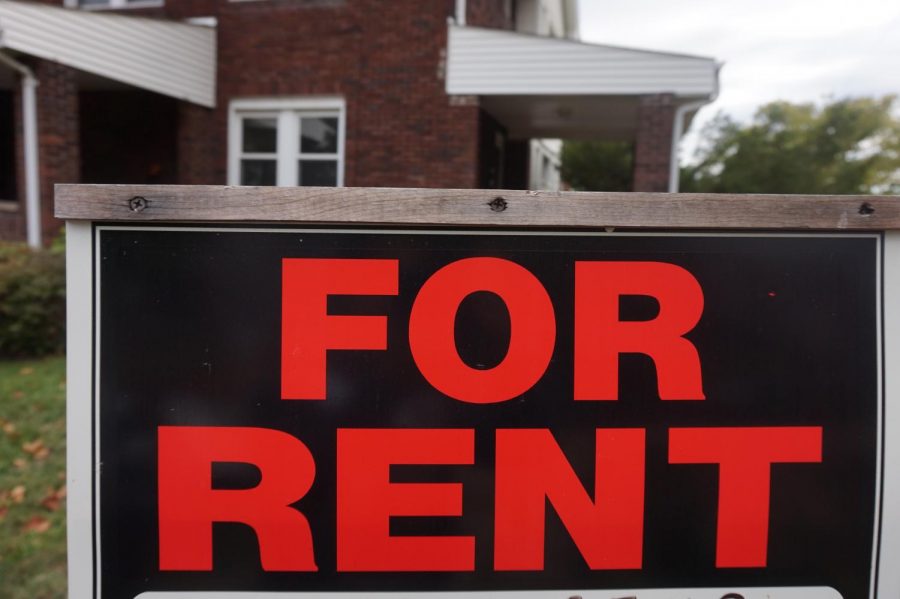 A “For Rent” sign.