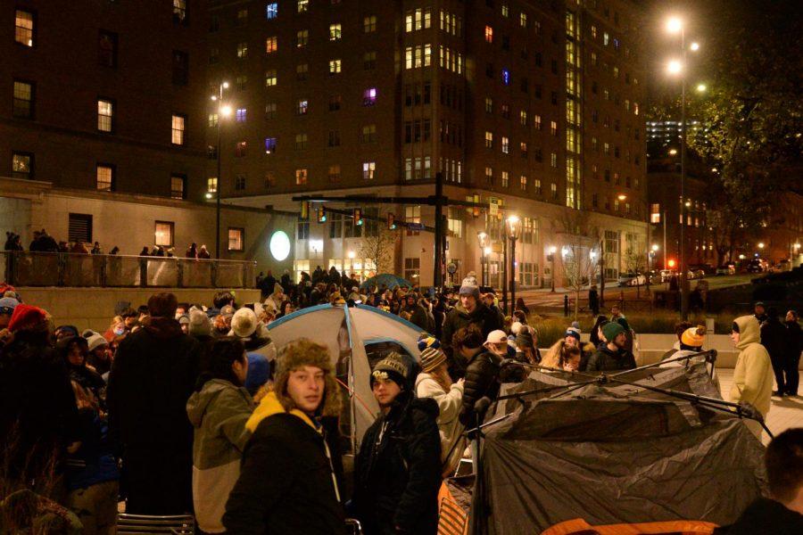 Hundreds of students, some equipped with tents, line up outside of the WPU Monday evening to purchase ACC Football Championship tickets, transportation and lodging.