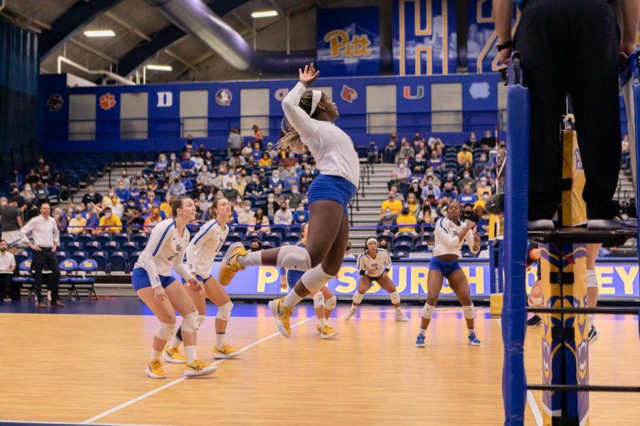 Pitt right side hitter Chinaza Ndee (5) prepares to hit the ball over the net at a game against University of Virginia at the Fitzgerald Field House on Sept. 29. 