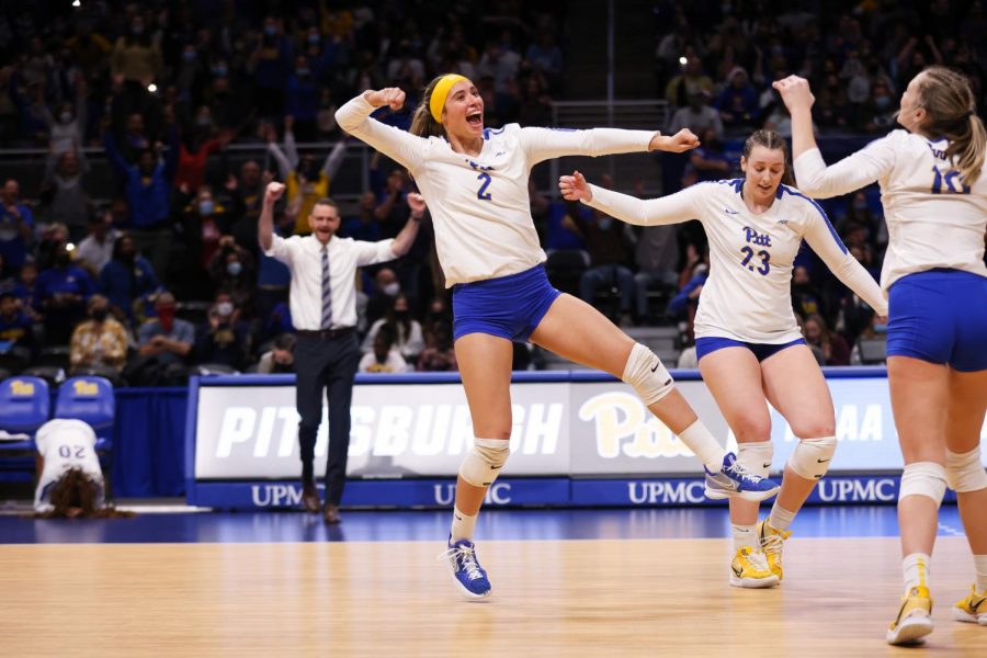 Pitt sophomore outside hitter Valeria Vazquez Gomez (2), graduate student outside hitter Kayla Lund (23) and first-year setter Rachel Fairbanks (10) celebrate during Saturday evening’s game against Penn State University at the Petersen Events Center.
