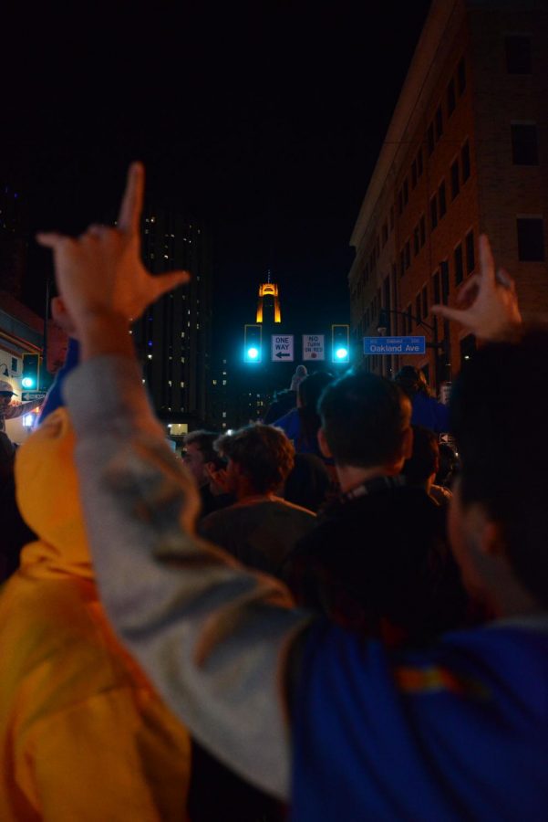 Pitt students celebrate Pitts Saturday night ACC Championship win against Wake Forest University at the intersection of Forbes and Oakland avenues. 
