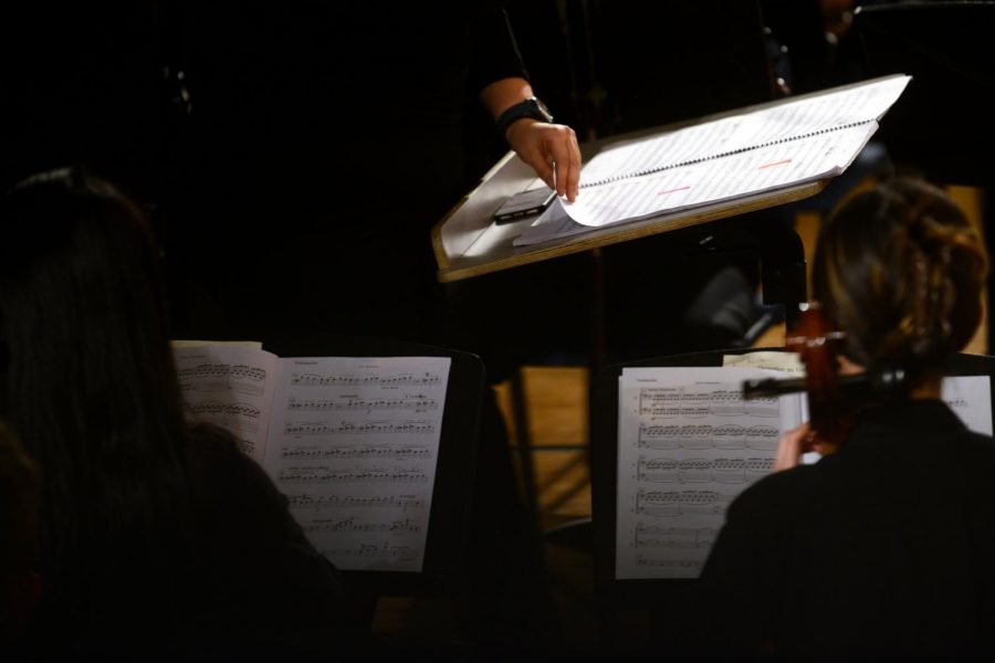 Miranda Bartira Sousa conducts Pitt Symphony Orchestra musicians as they play Alberto Nepomuceno’s Brazilian Suite during Wednesday nights performance at the Bellefield Hall auditorium.
