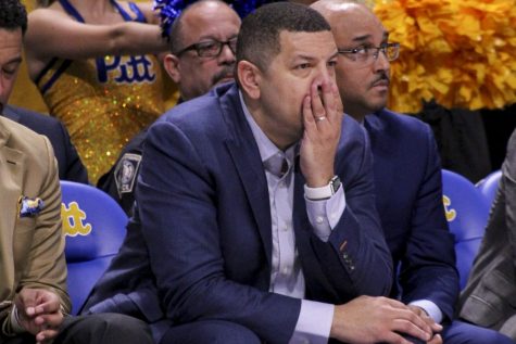 Head basketball coach Jeff Capel watches from the bench as a penalty call dashes the Panthers’ hopes to upset Louisville in January 2020.