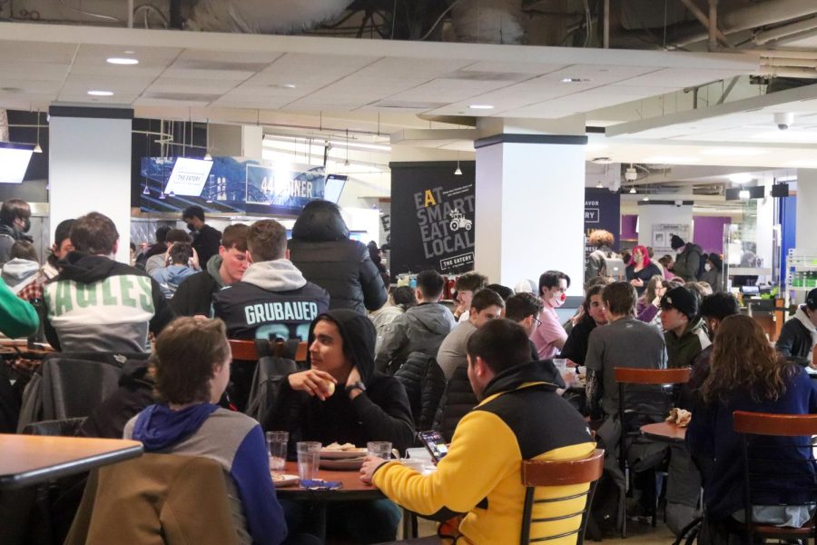 Pitt students dine indoors together in the Eatery on Thursday afternoon.