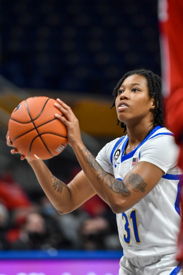 Pitt junior guard Destiny Strother (31) prepares to shoot at a game against North Carolina State University at Petersen Events Center on Dec. 10, 2021. 