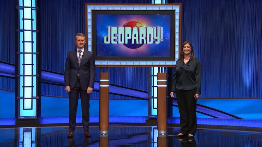 Jeopardy host Ken Jennings, left, and Pitt professor Ally Bove on the set of Jeopardy. 