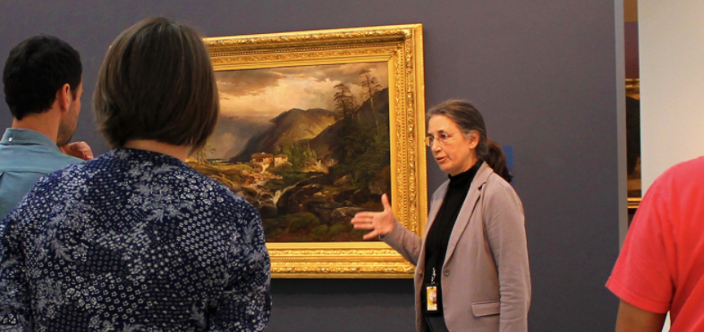 Pitt students discuss art while at the Carnegie Museum of Art.  