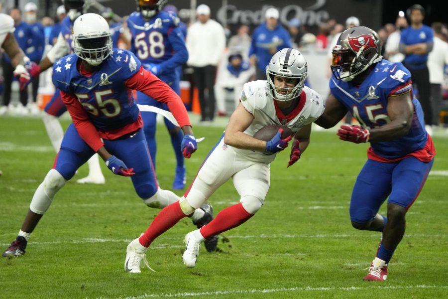 Las Vegas Raider wide receiver Hunter Renfrow, center, runs with the ball during Sunday’s Pro Bowl NFL football game in Las Vegas.