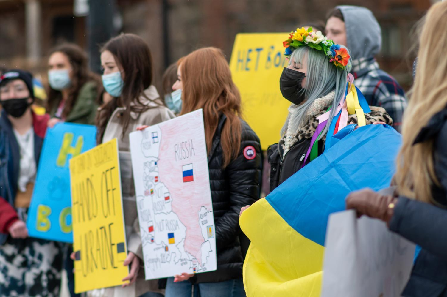 More than 20 students and faculty protested Friday afternoon at the Cathedral Lawn, in a show of solidarity for the recently-invaded Ukraine. 