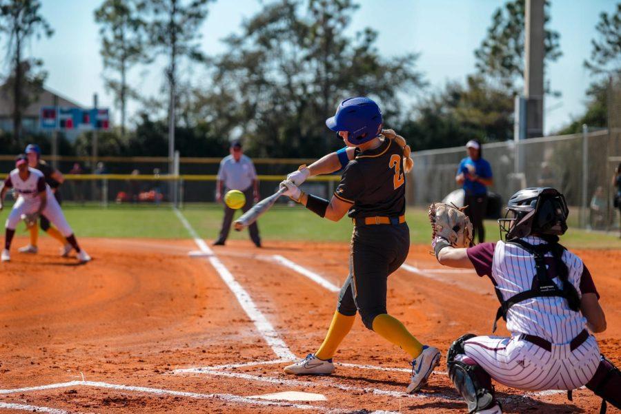 Pitt first-year softball player Haylie Brunson hits the ball during a game in the Northern Lights Invitational in Leesburg, Florida. 