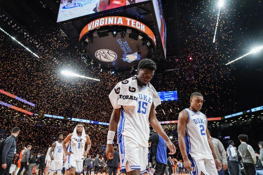 Duke University sophomore center Mark Williams (15) and his teammates walk off the court after losing to Virginia Tech at the Atlantic Coast Conference mens tournament on Saturday in New York. 