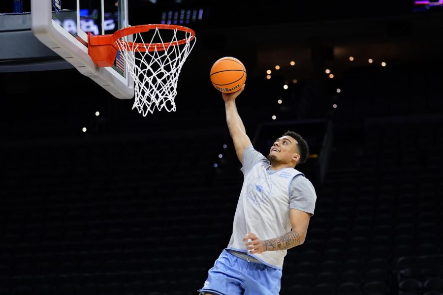 North Carolinas Justin McKoy goes up during practice for the NCAA mens college basketball tournament in Philadelphia on Thursday. 
