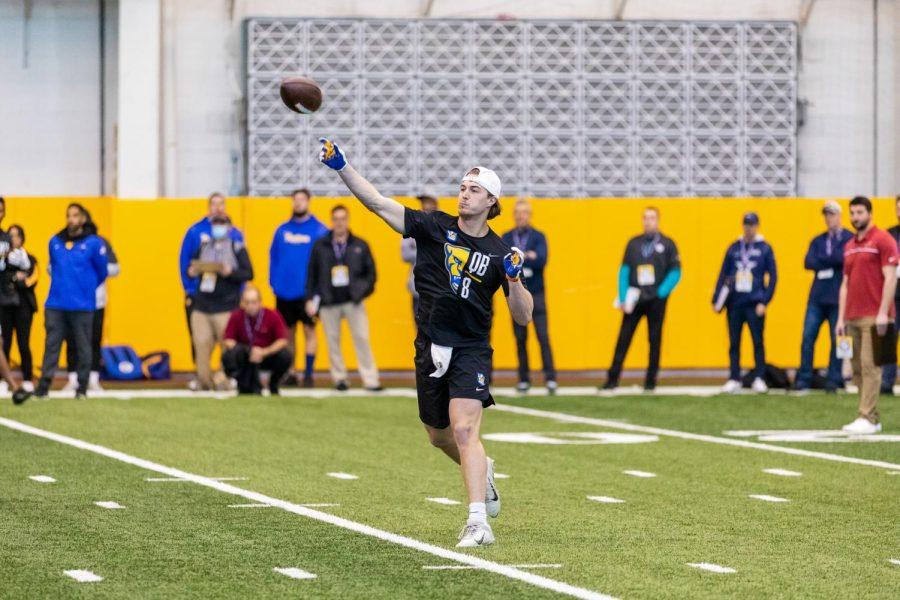 Quarterback Kenny Pickett throws a football at NFL Pro Day Monday afternoon.