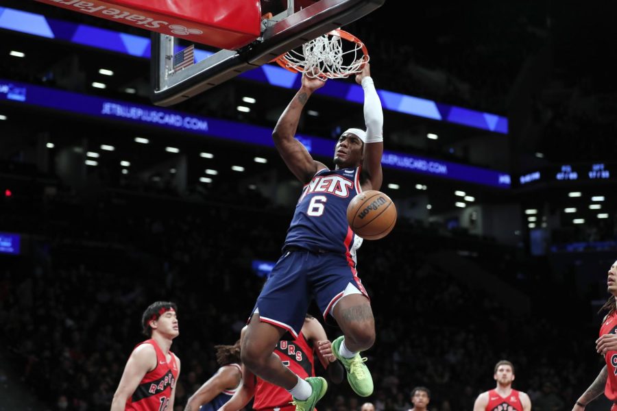 Brooklyn Nets forward David Duke Jr. (6) dunks against the Toronto Raptors during the second half of an NBA basketball game Monday, Feb. 28, 2022, in New York. The Raptors won 133-97. 