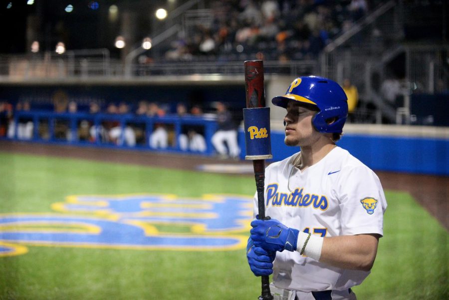 Pitt first-year utility position player Josh Overbeek (17) prepares to bat during Friday’s game against the University of Virginia. 