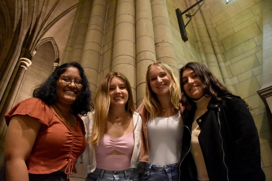 Zoe Frantz, Annabel Summo, Meg Anderson and Ananya Pathapadu of Empower Club in the Cathedral of Learning.