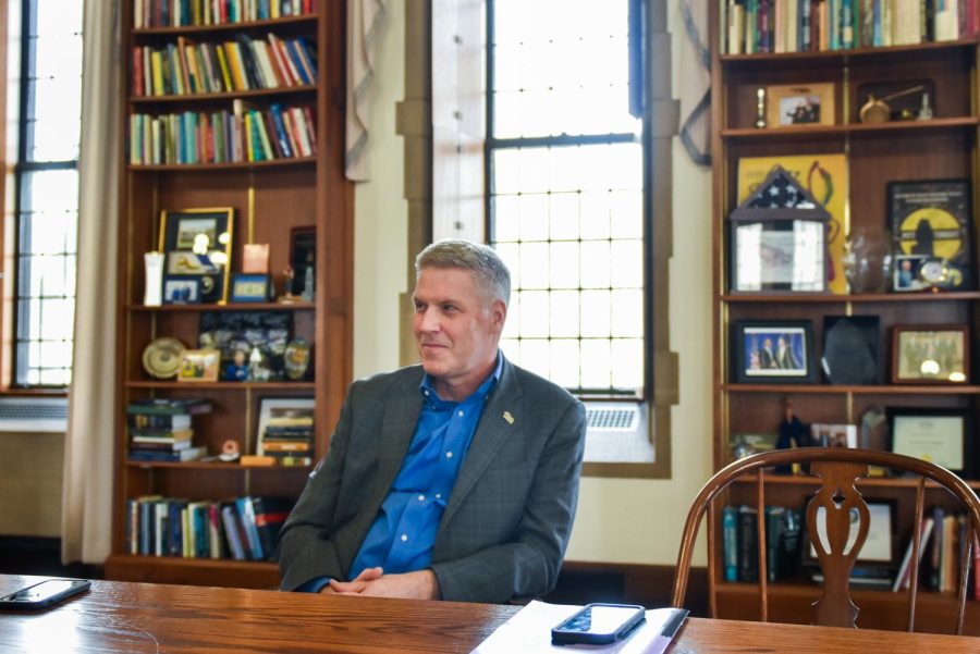 Chancellor Patrick Gallagher listens during an interview in the Cathedral of Learning.