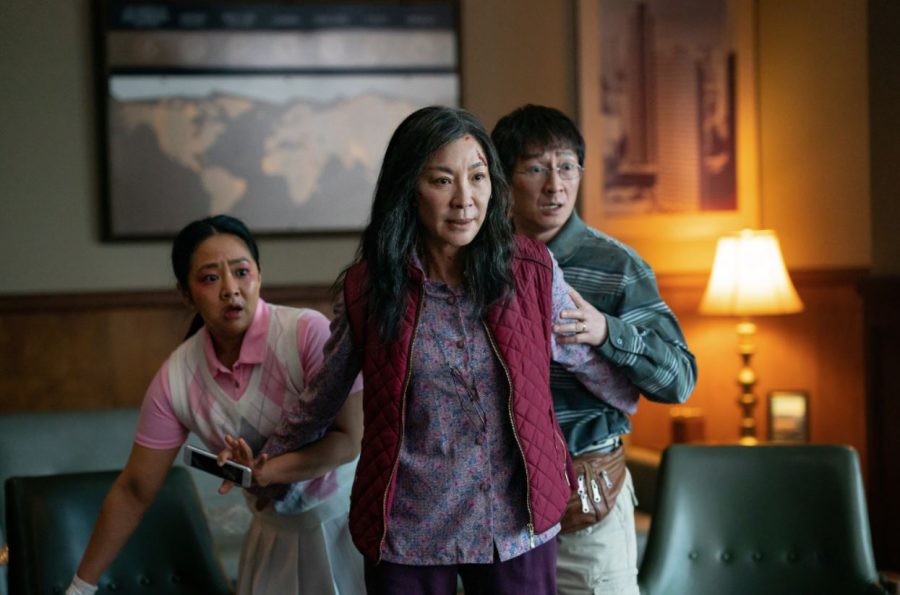 From left, Stephanie Hsu plays Joy Wang, Michelle Yeoh plays Evelyn Quan Wang and Ke Huy Quan plays Waymond Wang in “Everything Everywhere All at Once.”
