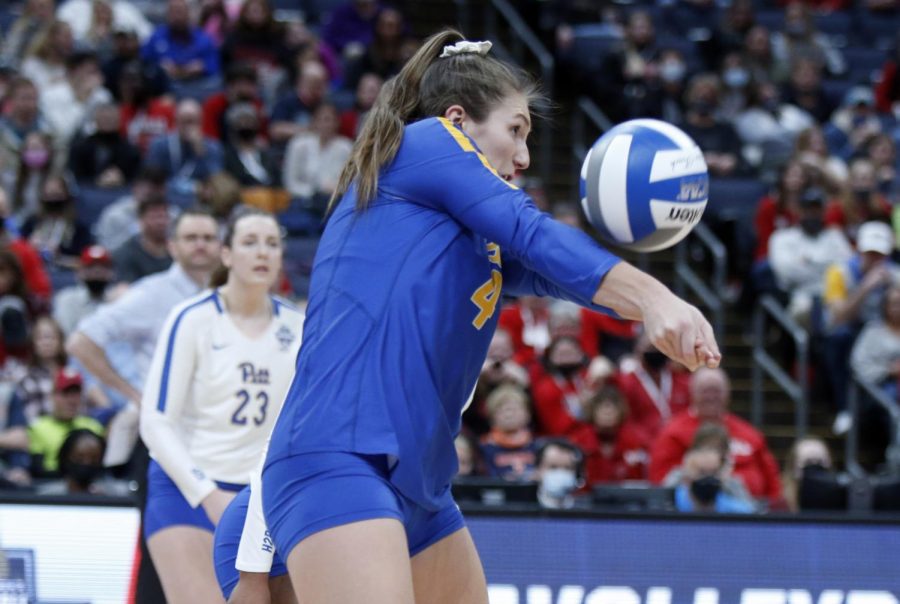 Pitt’s Ashley Browske (4) hits a pass during a semifinal of the NCAA women's college volleyball tournament against Nebraska in December. 