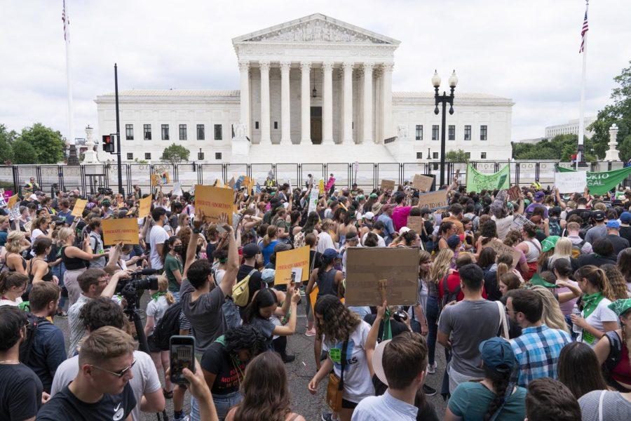 Protesters gather outside the Supreme Court in Washington, Friday, June 24 after the Supreme Court revoked the federal right to an abortion.
