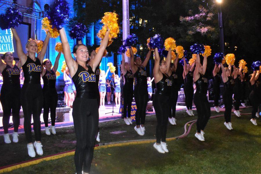 Members of the Pitt Dance team perform during the Pitt Program Council’s annual bonfire and pep rally Tuesday night.