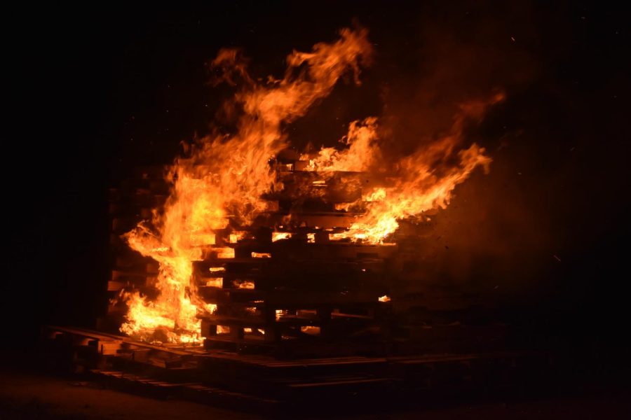 A bonfire burns during the Pitt Program Council’s annual bonfire and pep rally Tuesday night.
