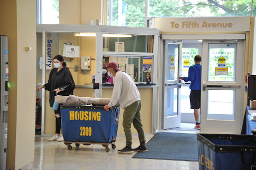 A new crop of students move into the Towers, a tax-exempt building that would generate about $363,000 to the city each year if it was taxable.