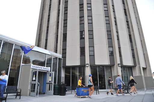 Students moving into Litchfield Towers, the largest cluster of dorms on Pitts main campus, ahead of the new academic year during August 2022.