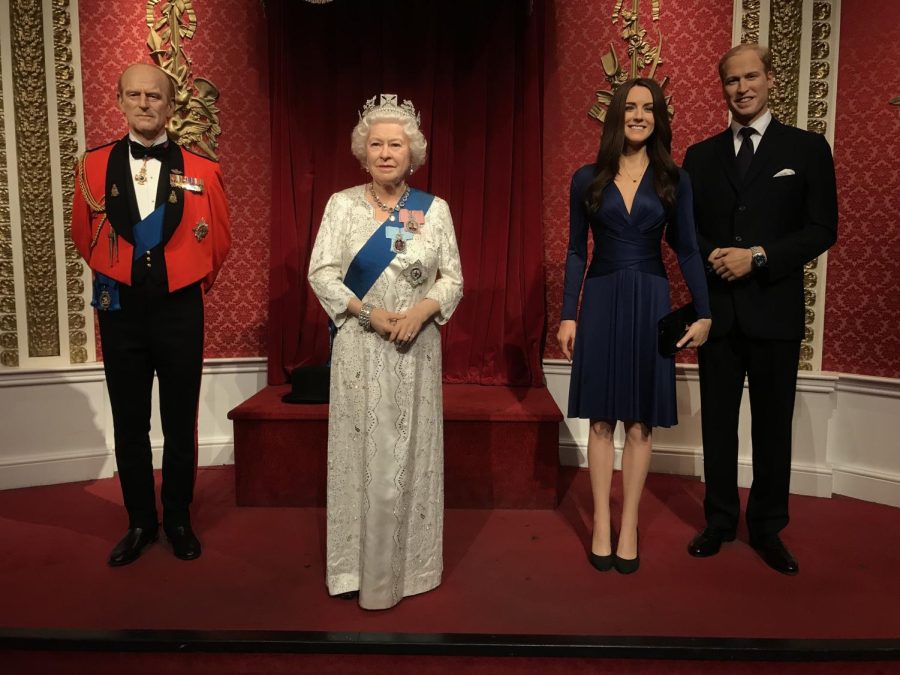 Wax figures of the British Royal Family at Madame Tussauds in London. 
