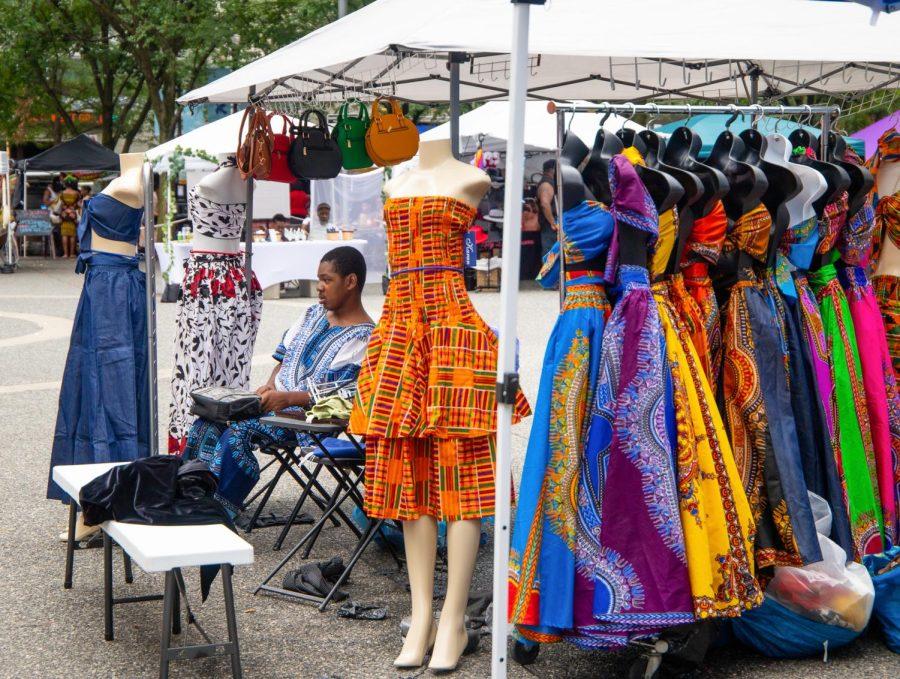A vendor sells clothing at A Soulful Taste of the Burgh, an annual soul food and music festival, in Market Square on Saturday.