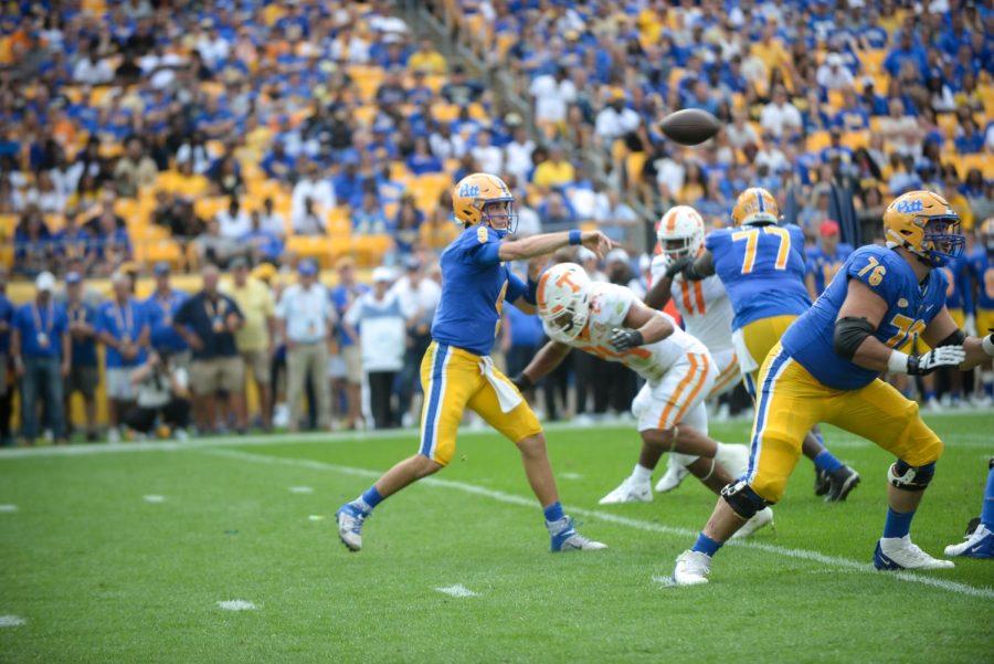 Senior quarterback Kedon Slovis (9) attempts a pass at Saturday's game against Tennessee at Acrisure Stadium. 