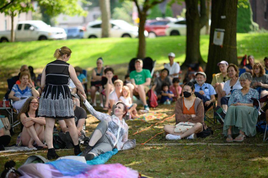Hermia, left, and Lysander wish each other good night in PSiP’s production of “A Midsummer Night’s Dream” in Westinghouse Park in Homewood Saturday. 
