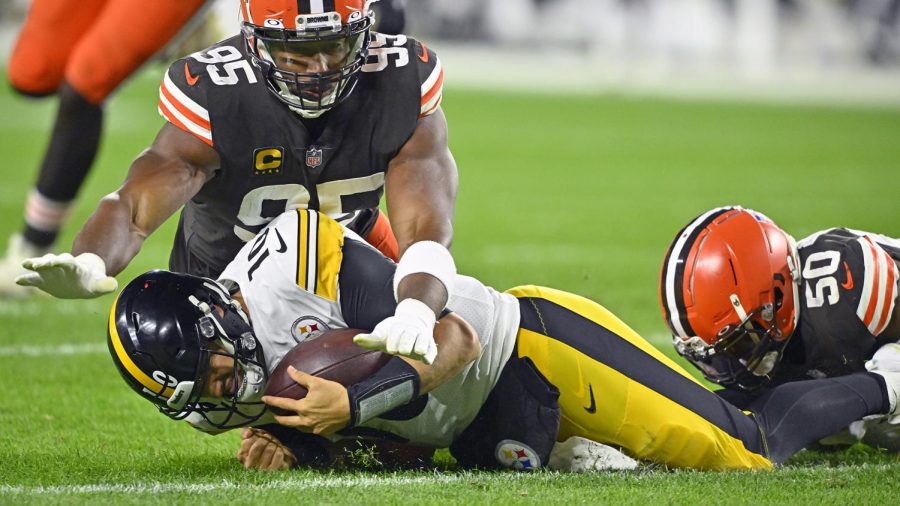 Pittsburgh Steelers quarterback Mitch Trubisky (10) is sacked by Cleveland Browns Jacob Phillips (50) and Myles Garrett (95) during the second half of an NFL football game in Cleveland, Thursday, Sept. 22.