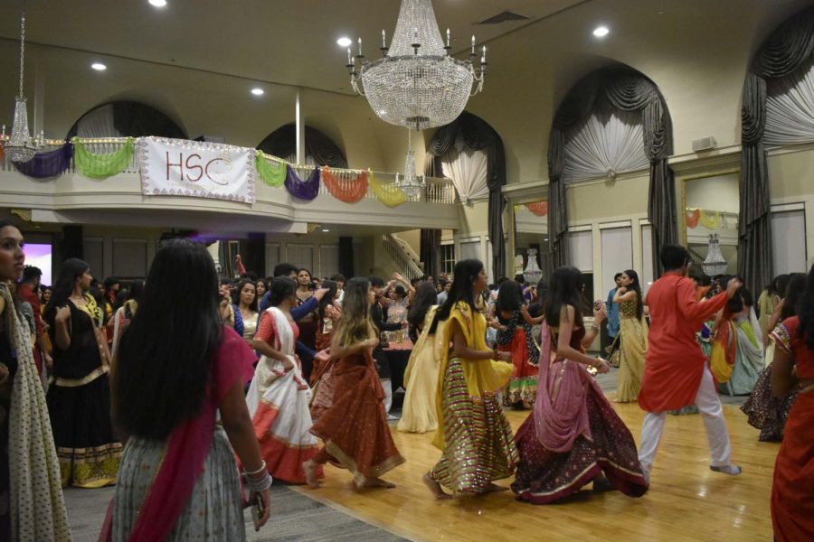 Pitt students dance during the Hindu Students Council’s Garba night in the O’Hara ballroom in the O’Hara Student Center on Saturday night. 
