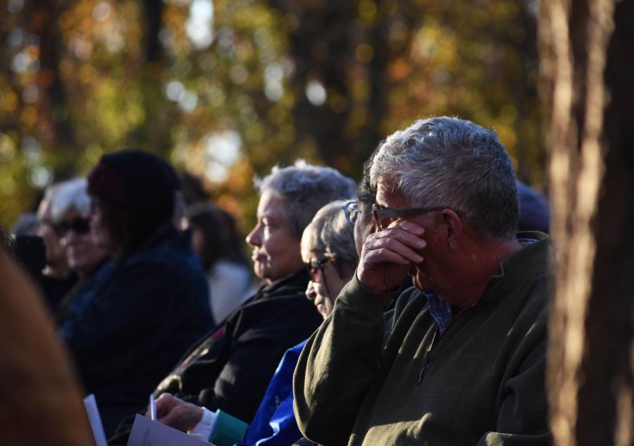 Community members mourn the lives lost in the Tree of Life shooting during a ceremony in Schenley Park on Thursday afternoon. 
