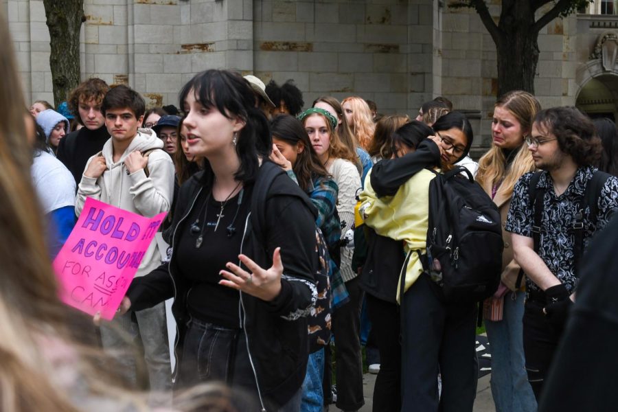 Pitt students embrace during a protest against sexual violence outside of the Cathedral of Learning in October.