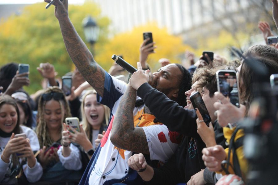 Waka Flocka Flame performs and takes photographs with Pitt students during PPC’s Fall Fest on Schenley Drive on Sunday. 