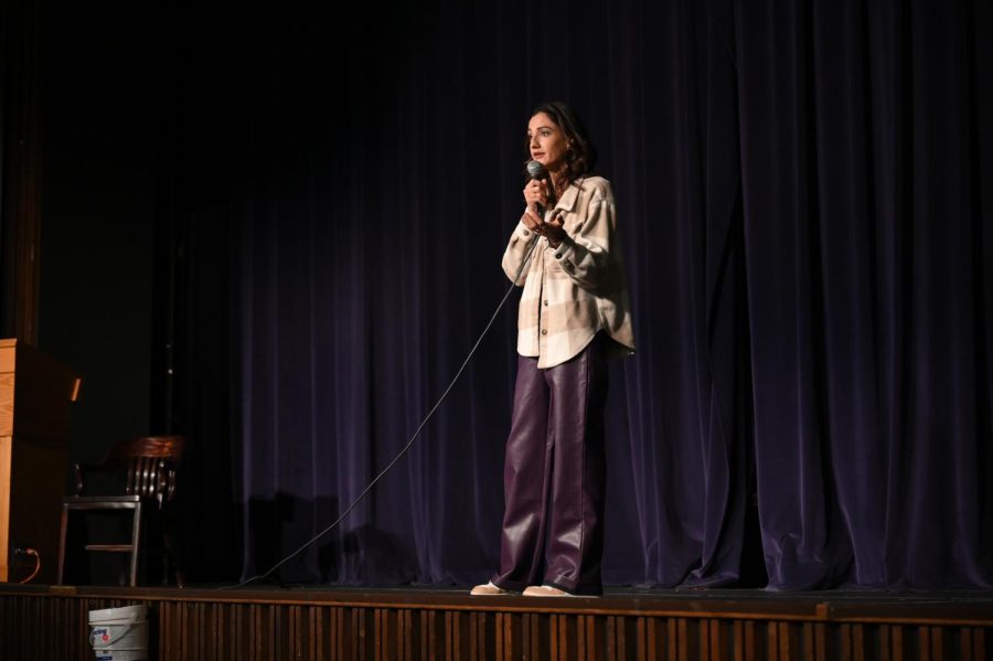 Comedian Stephanie Foster performs her comedy show “Without Rhyme Nor Reason” in the Alumni Hall auditorium on Tuesday. 