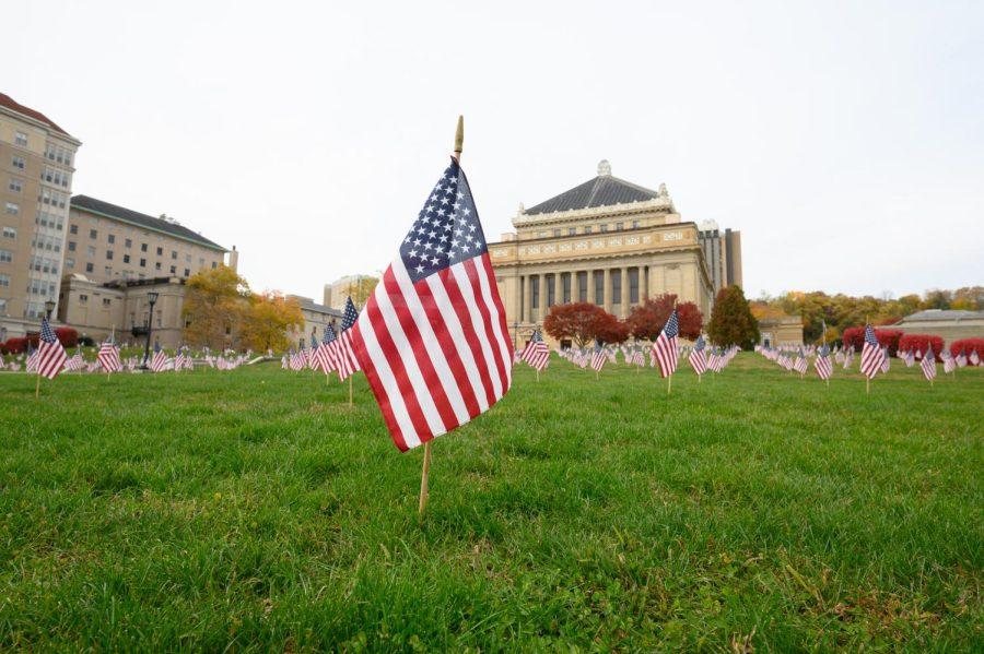 American flags decorate the lawn of Soldiers & Sailors Memorial Hall & Museum on Fifth Avenue. 
