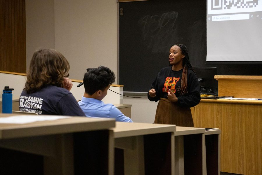 Rep. Summer Lee, right, speaks to students gathered in a Barco Law building classroom on Thursday evening. 