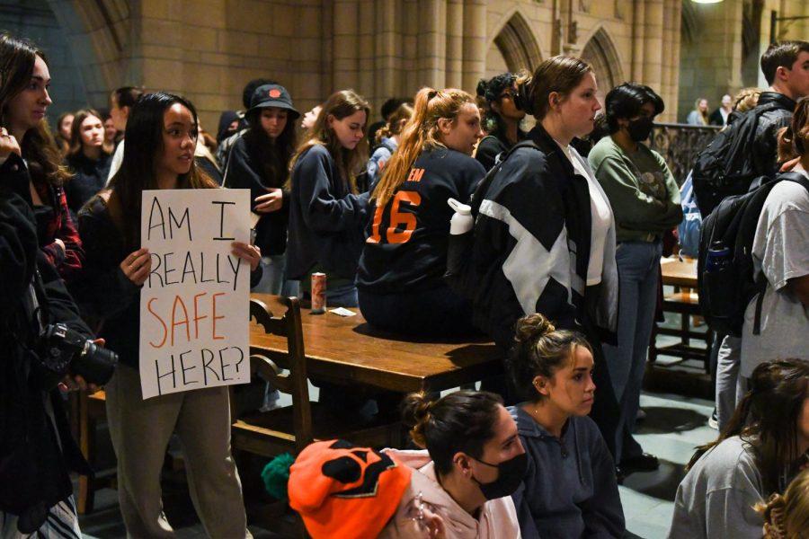 Students gather during a protest against sexual violence in the Cathedral of Learning on Oct. 7.