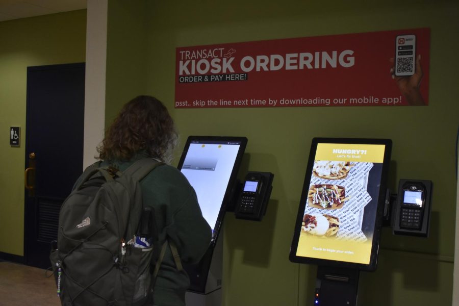 Students use a kiosk in the William Pitt Union.