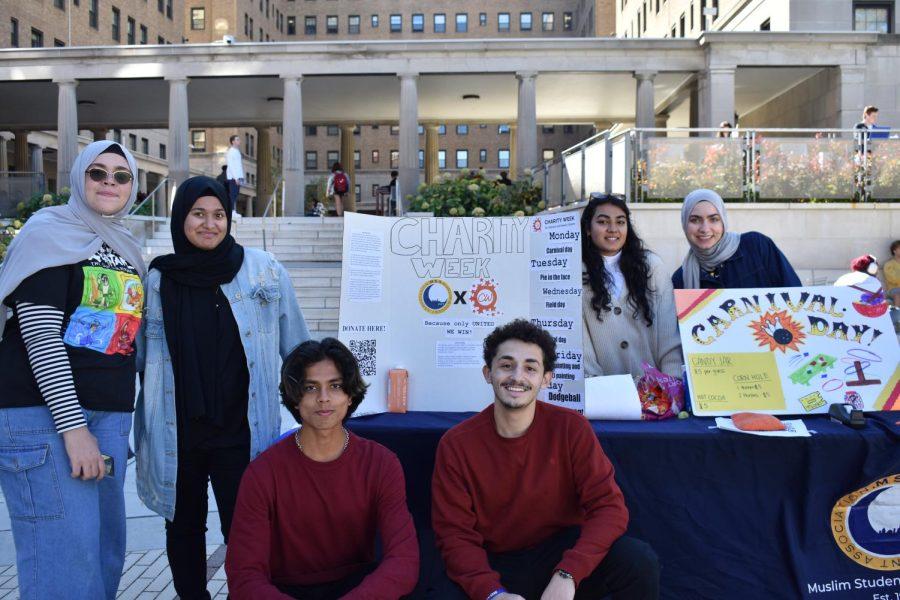 Members of Pitt’s Muslim Student Association at a charity week fundraiser by the William Pitt Union on Monday.