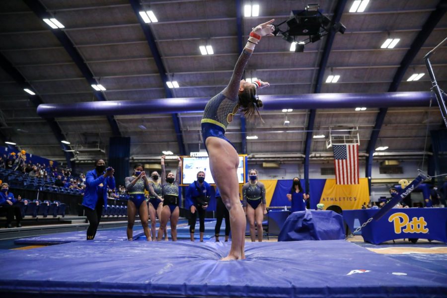 A Pitt gymnast lands.