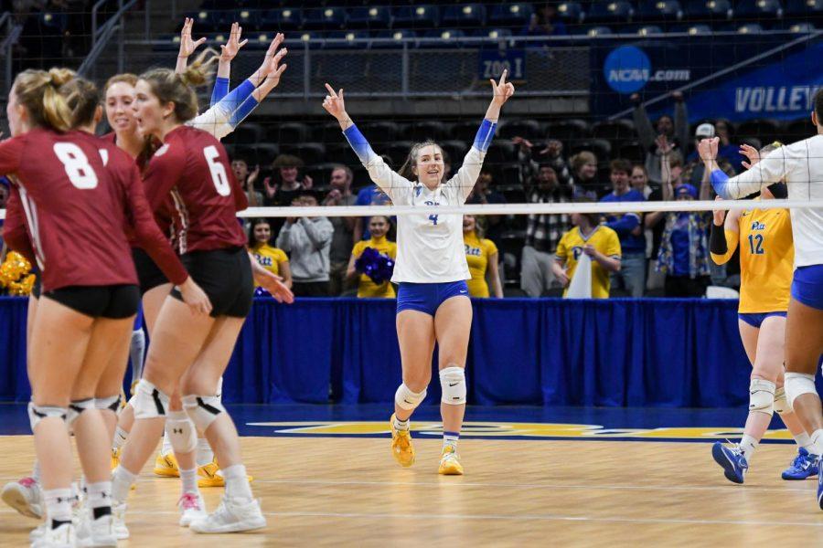Senior defensive specialist Ashley Browske (4) celebrates after Pitt scores during Pitts game against Colgate in the first round of the NCAA womens volleyball tournament in the Petersen Events Center Friday night. 